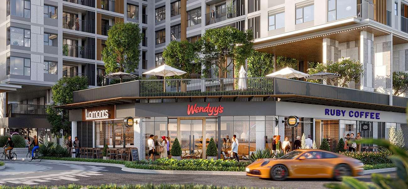 Ground-floor shophouse frontage and vehicle drop-off at Elysian