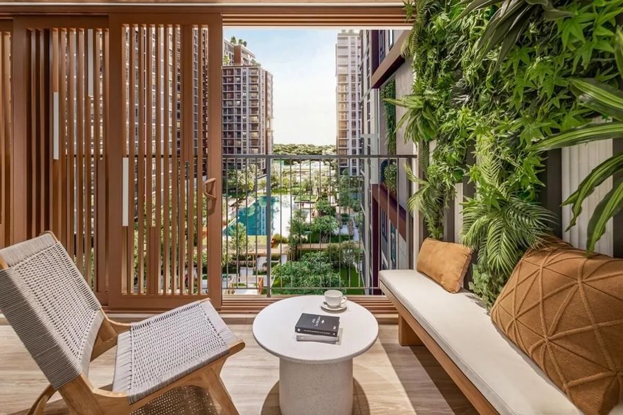 Elysian Lanai outdoor area with timber screen, bench and a view over the pool and gardens