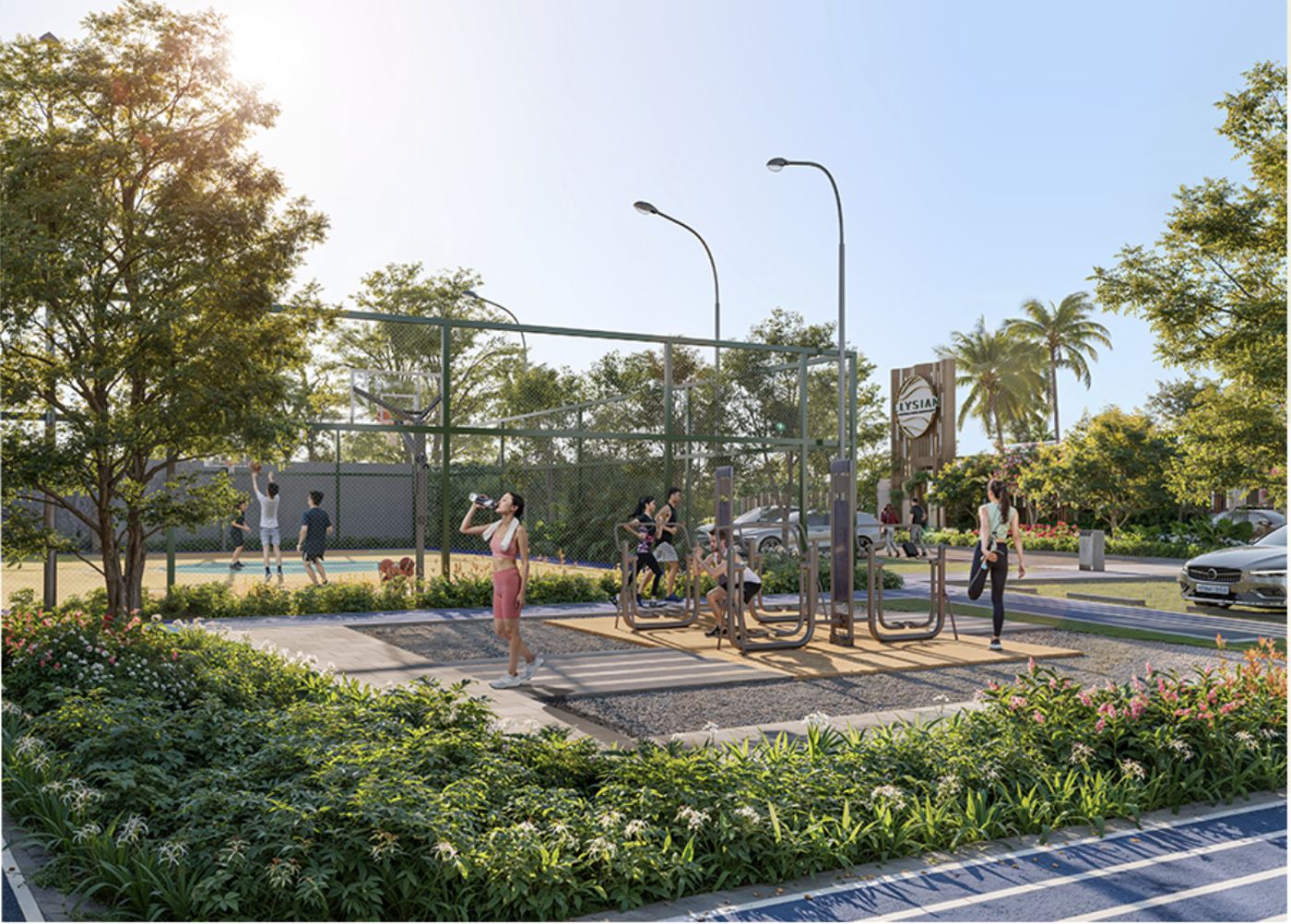 Basketball court and outdoor fitness equipment beside the Elysian entrance gate, framed by flowering planting and shade trees